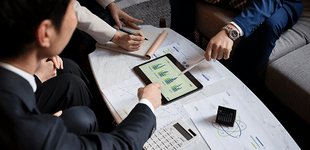 People looking at graphs