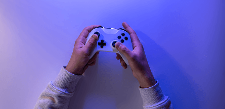 hands playing video game