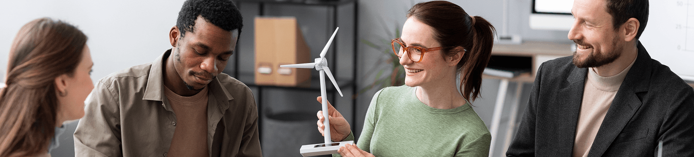People with wind energy mockup